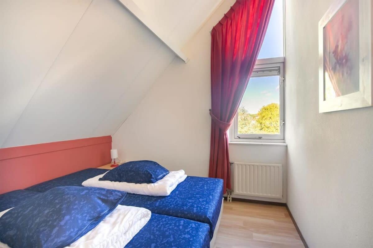 Vrijstaand vakantiehuis met tuinhuis en veranda - Zwin 004 Breskens Buitenkant foto